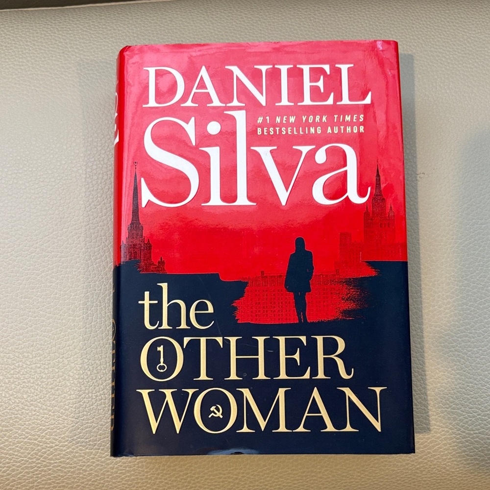 Red and Blue 'The Other Woman' Book by Daniel Silva